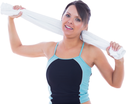 Portrait of woman in sportswear holding towel around neck