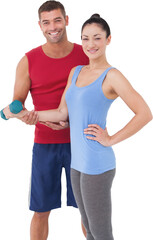 Fit woman and trainer smiling at camera