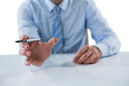 Midsection of businessman showing glass sheet