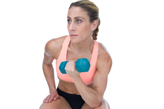 Strong woman doing bicep curl with blue dumbbell