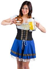 Pretty oktoberfest girl holding beer tankard and pretzel
