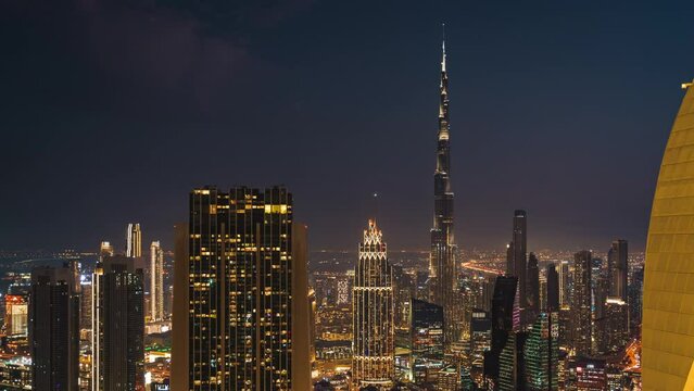 Day to night timelapse view of modern skyscrapers in Downtown Dubai, United Arab Emirates (UAE), business and finance concept.