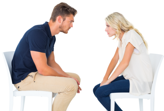 Young couple sitting in chairs arguing