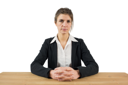 Businesswoman frowning at the camera - Powered by Adobe