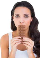 Tuinposter Pretty brunette eating bar of chocolate © vectorfusionart