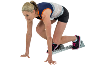 Female athlete in position ready to run
