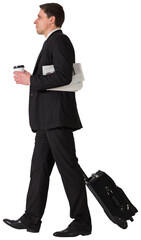 Handsome businessman pulling suitcase