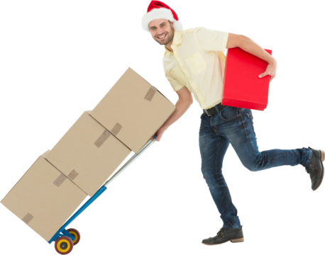 Delivery man pushing trolley of boxes during Christmas