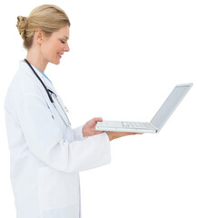 Blonde doctor using laptop