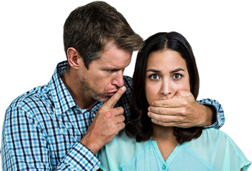 Man covering woman's mouthc