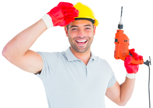 Smiling manual worker holding drill machine