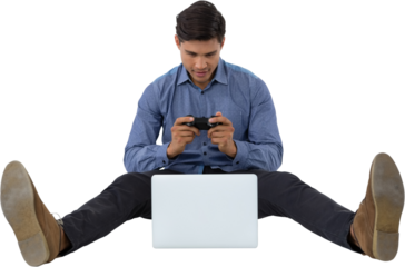 Full length of businessman playing video game on laptop