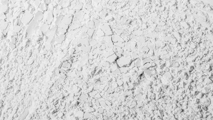 Texture of cracked white sand. powder, flour, cracks. Textured, cracked. White. Banner, advertising. Empty space. For an inscription.