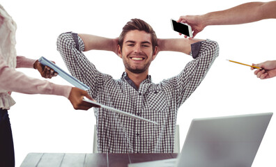 Smiling businessman being handed items