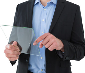 Mid section of businessman using transparent glass interface