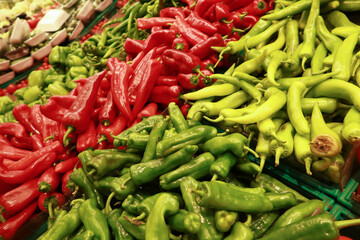  green and red capsicum displaying at shop 