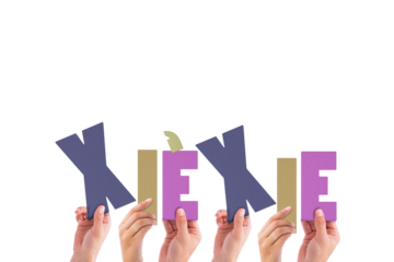 Colorful alphabet spelling thank you in Chinese held up by people 