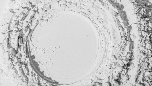 Texture of powder, flour, sand. White. extruded circle. Textured, cracked. White. Banner, advertising. Empty space. For an inscription.
