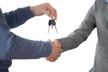 Corporate man shaking hands and giving keys