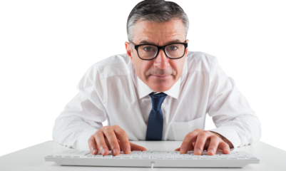 Mature businessman typing on keyboard