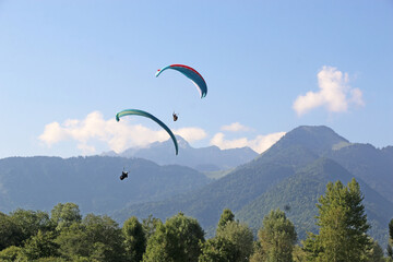 Paragliders above Lake Annecy in the French Alps	