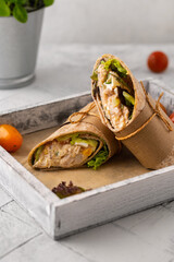 Wraps made from tortilla, tuna and fresh vegetables.