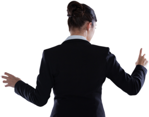 Rear view of businesswoman using imaginative digital screen