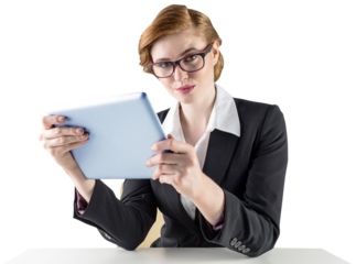 Redhead businesswoman using her tablet pc