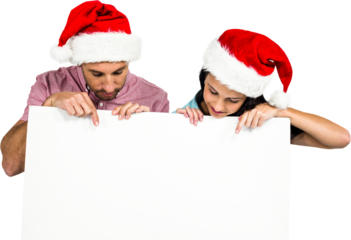 Festive couple holding sign board
