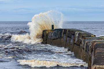 waves crashing on the rocks
