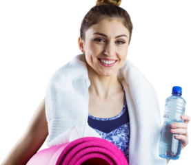 Fit brunette holding yoga mat