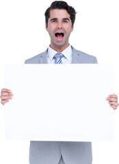 Surprised businessman holding blank billboard