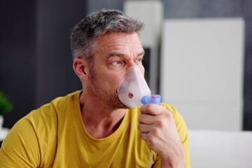Asthma Patient Breathing Using Oxygen Mask