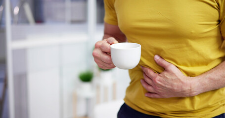 Coffee Stomach Ache. Digesting Acid Pain