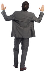 Businessman posing with arms raised