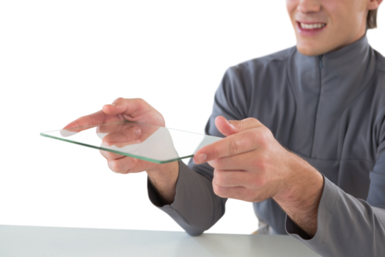 Mid section of smiling businessman giving glass interface