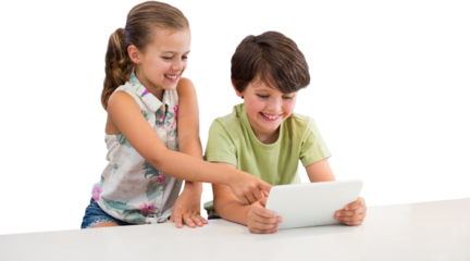 Boy with sister using digital tablet