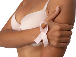 Woman standing for breast cancer awareness in bra with ribbon against white background