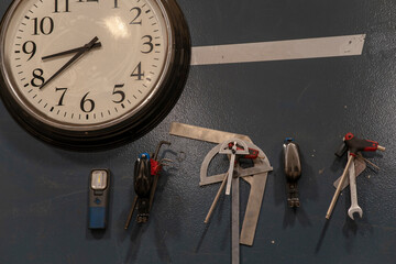 Clock and different measuring instruments on the wall