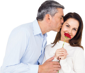 Fototapeta premium Portrait of wife holding rose with husband