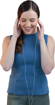 Beautiful woman listening to music on earphones