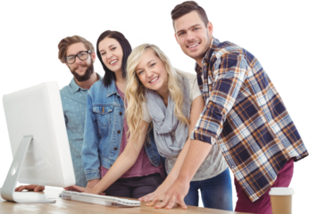 Portrait of smiling business people working at computer desk 