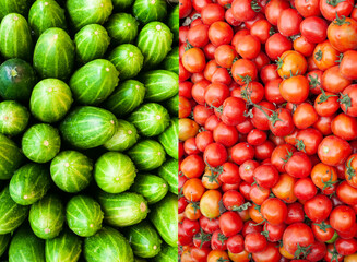 Delicious red tomatoes and fresh green cucumbers for the background concept. 