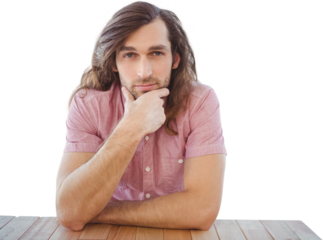 Portrait of confident man with hand on chin