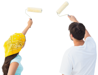 Happy young couple painting together