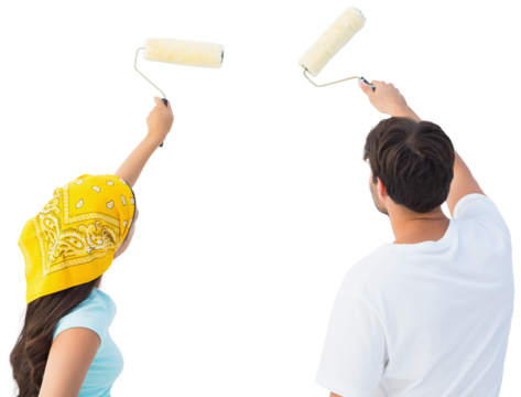 Happy young couple painting together