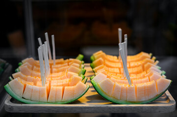 fresh ripe sweet melon slices piece  in fruit market