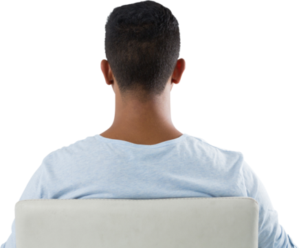 Rear view of man sitting on chair