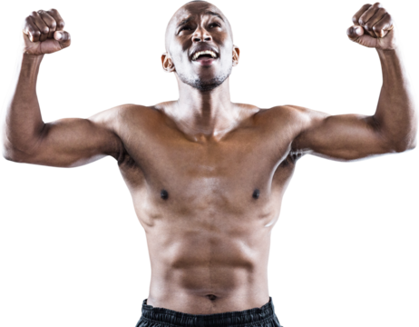 Happy shirtless athlete cheering with clenched fist