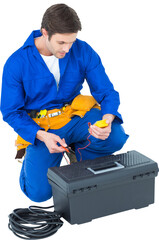 Electrician using multimeter over white background